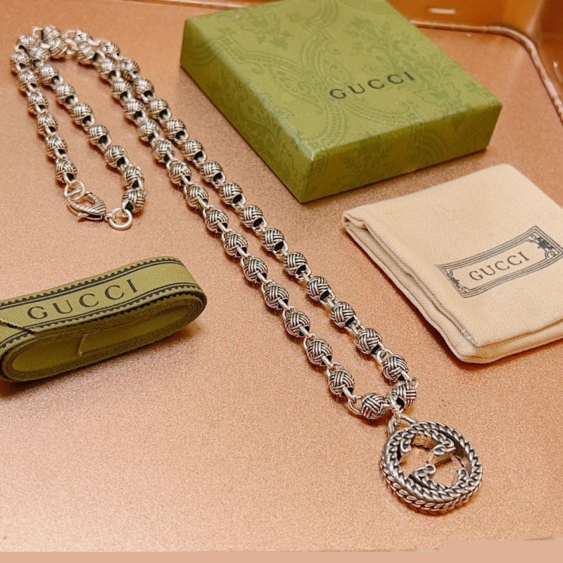 G*u*i necklaces